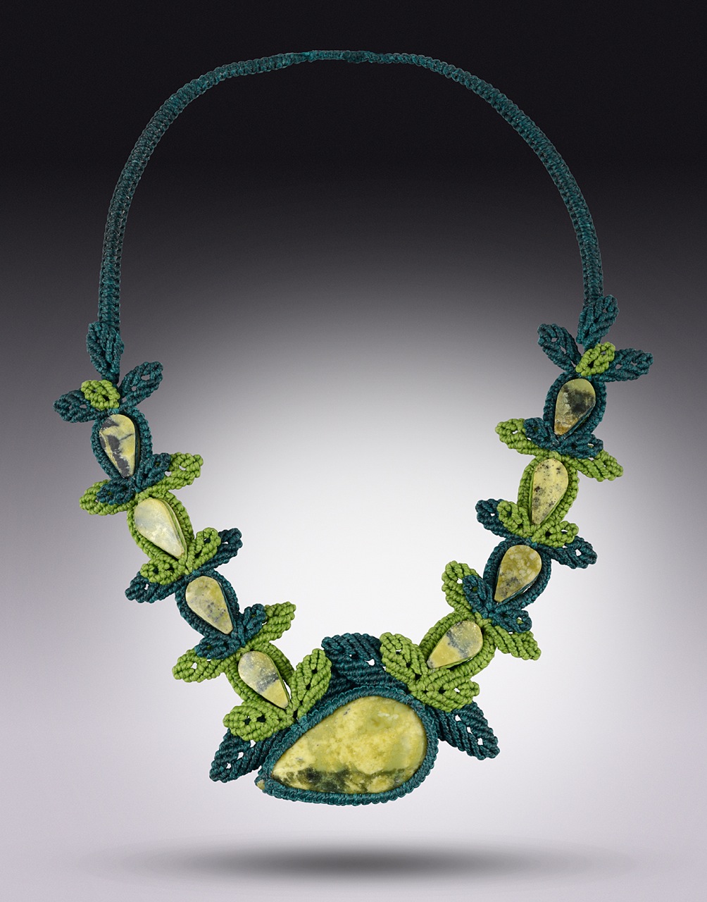 Fiber art jewelry macrame necklace Eterna Verde by Coco Paniora Salinas of Rumi Sumaq rumisumaq.com