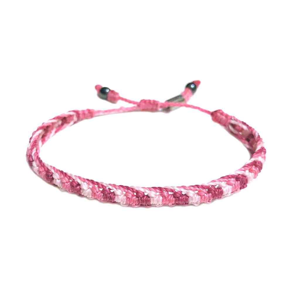 Braided Bracelet Pink with Hematite Stones by Designer Coco Paniora Salinas of RUMI SUMAQ. Handmade Woven Bracelets from Martha's Vineyard.
