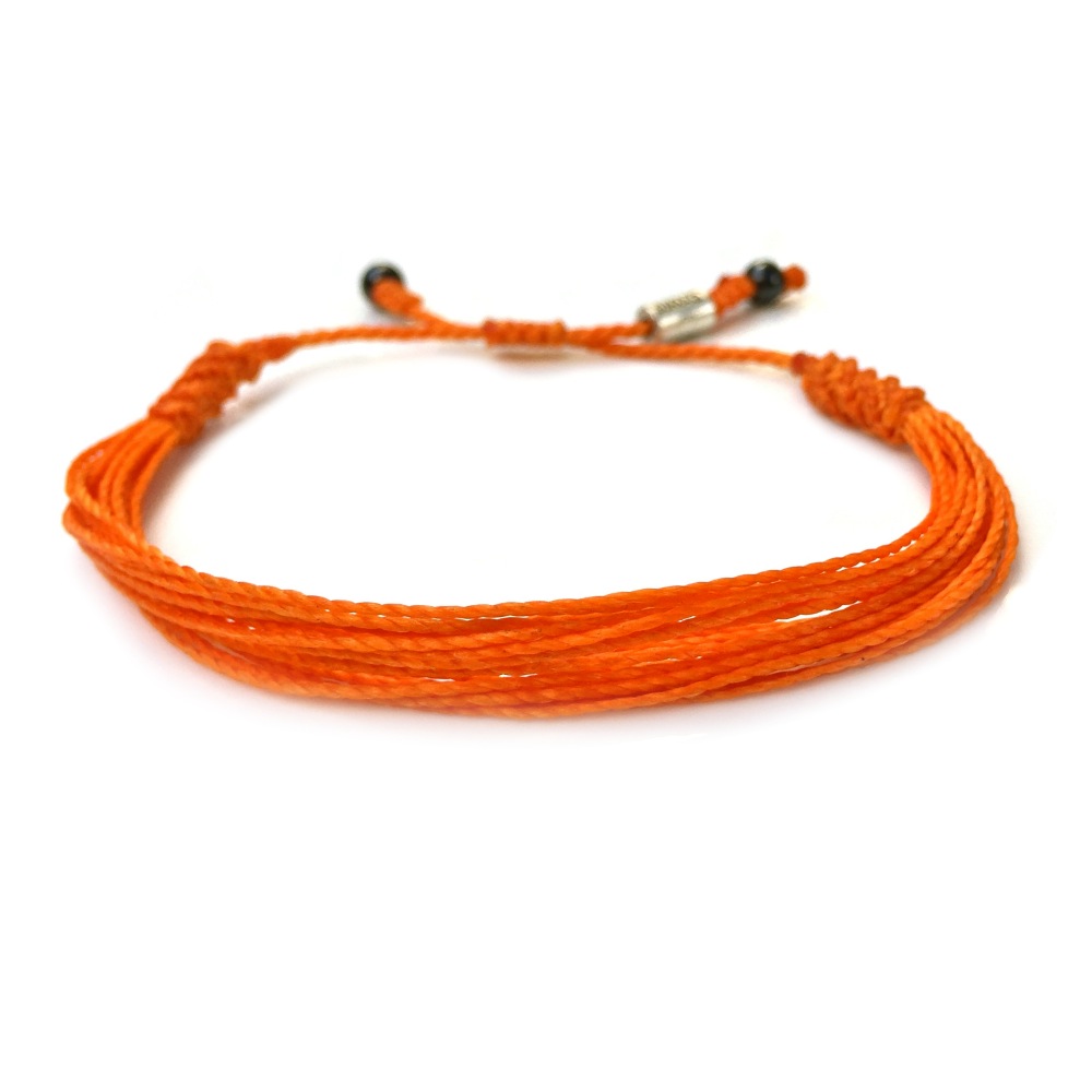 Orange awareness bracelet by RUMI SUMAQ